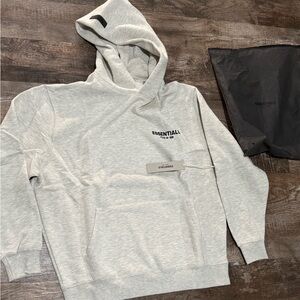 NWT essential fear of god mens L hoodie